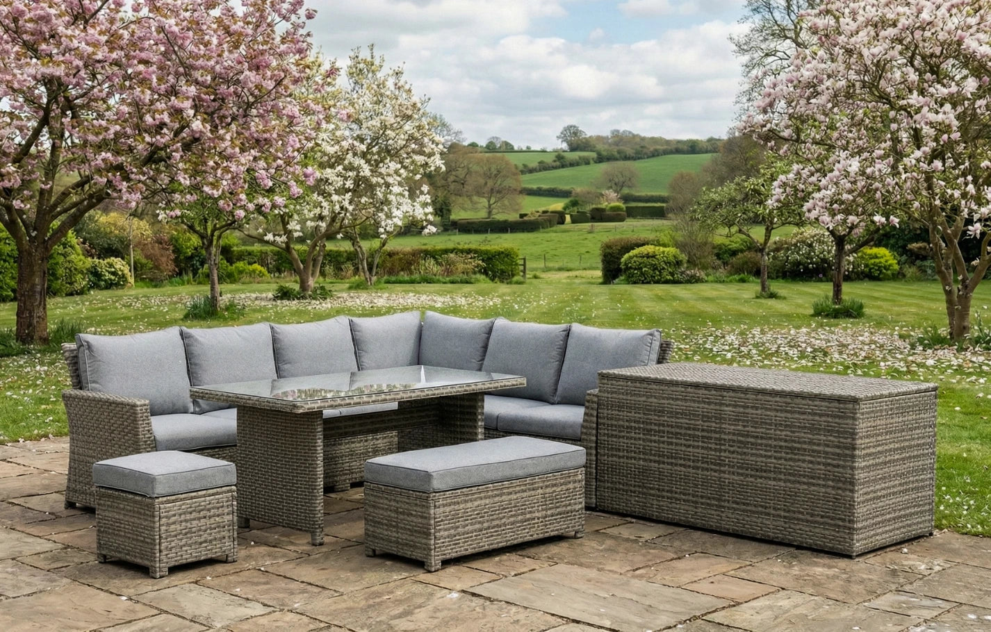 Gray woven wicker corner sofa lounge set with cushions and glass-top table rattan garden furniture bundle