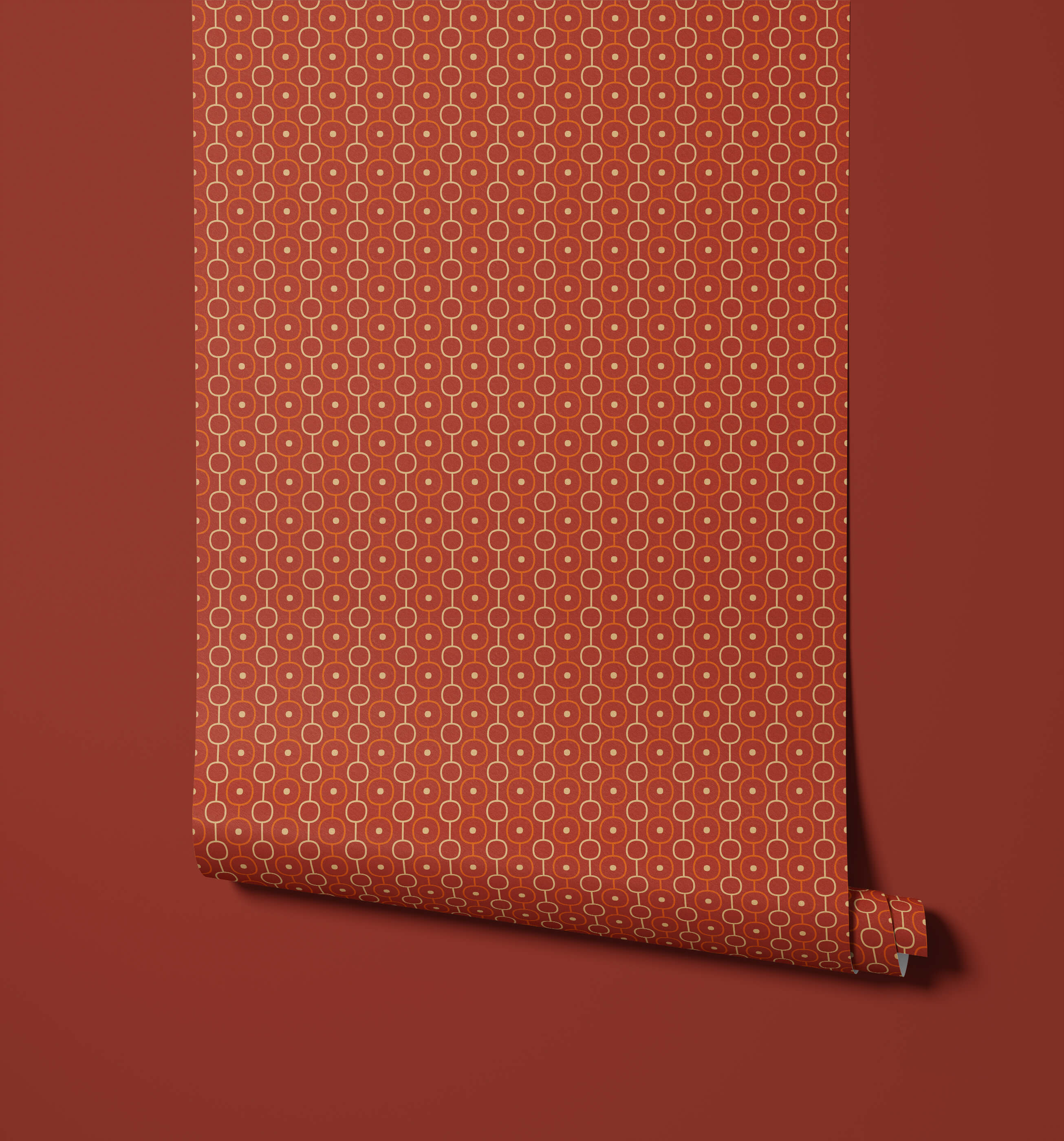 A roll of palna terracotta wallpaper with a repeating white circle and dot pattern for stylish walls