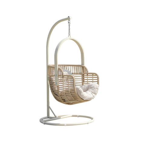 Beige woven rattan garden hanging egg chair with white cushion and cream metal frame from paloma rattan garden collection