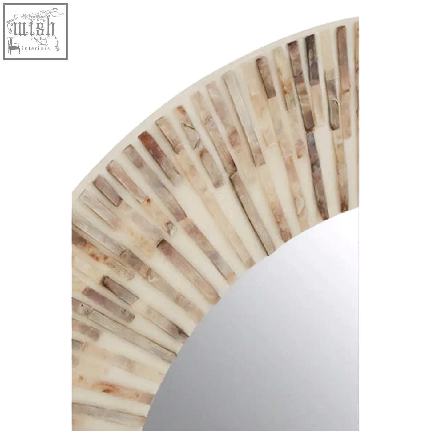 Curved frame of palu natural shell round wall mirror made from light-toned bone with subtle marbled veining