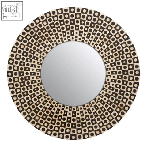 Palu round black wall mirror with an intricate shell inlay frame of alternating dark brown and cream squares with dots