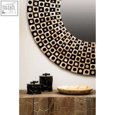 Palu round black wall mirror with shell inlay featuring a black and beige geometric patterned frame