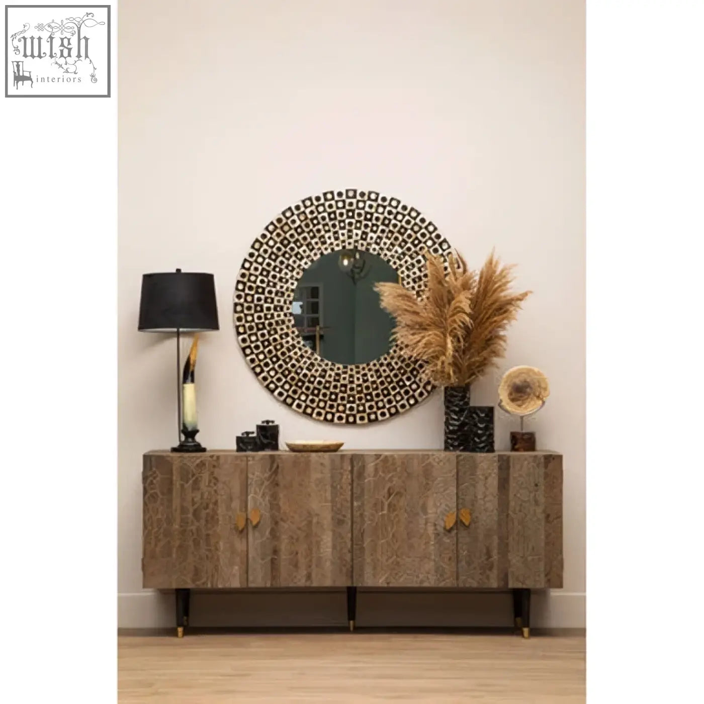 Palu round black wall mirror with shell inlay features a dark intricate geometric patterned black wall mirror frame