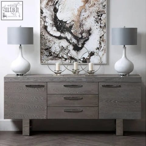 Gray wood-grain sideboard with sleek metal handles perfect for modern white table lamp setups and minimalist white table decor