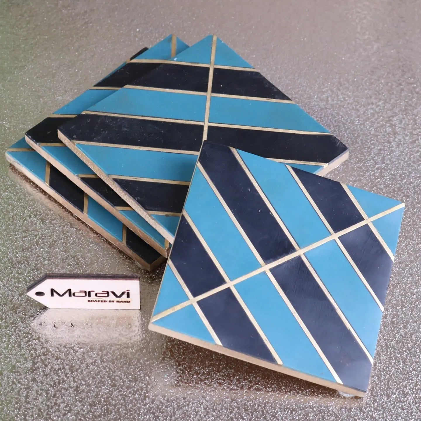Panna luxe resin coaster set of 4 with hand-shaped blue and navy geometric mosaic tiles and white grout lines