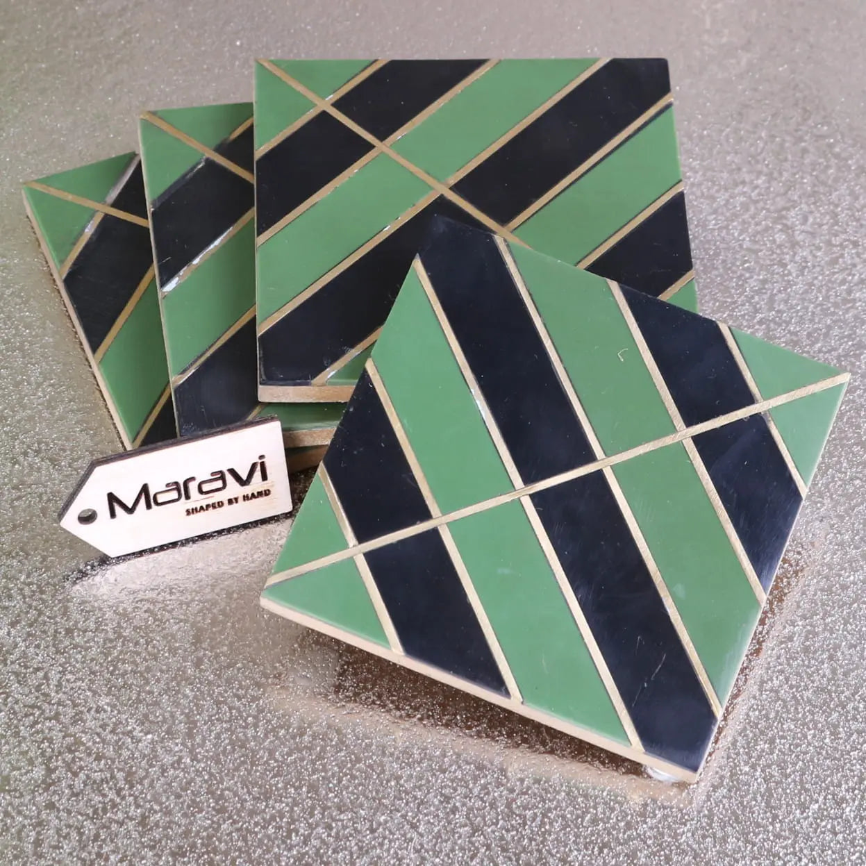 Panna luxe resin coaster set of 4 hand-shaped coasters with geometric green and navy tiles separated by gold lines