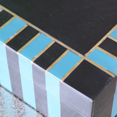 A sleek black and teal panna luxe resin jewellery box bench with gold grout lines perfect for luxe resin jewellery storage