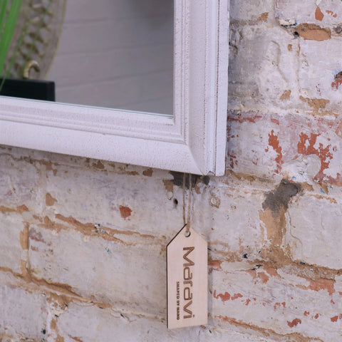 White distressed wooden frame window style mirror with hanging maravi tag in panna rustic style mirror collection