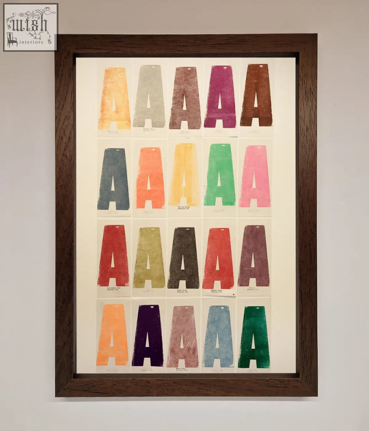 A framed poster featuring a colorful grid of textured capital a letters with multiple frame options available