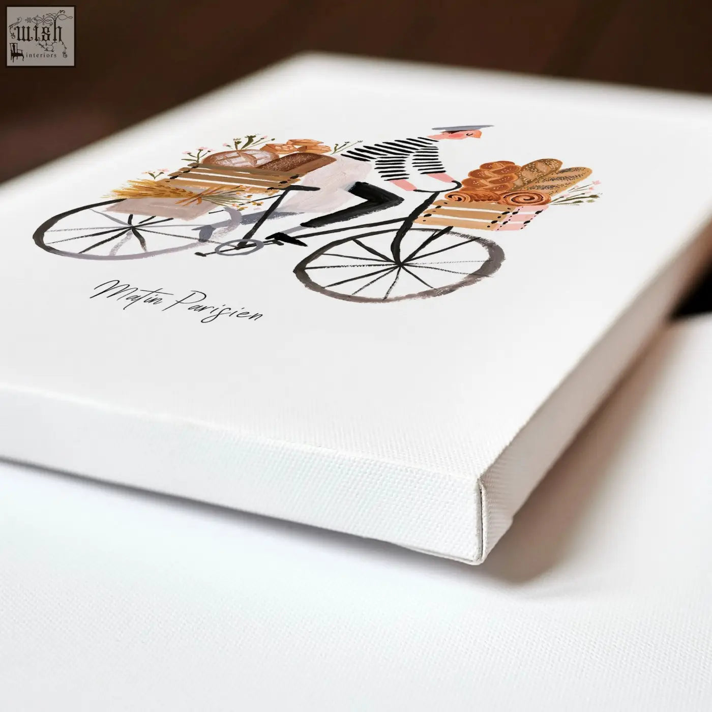 White canvas wall art with a cyclist carrying bread in brown tones for matin parisien kitchen decor set of 3