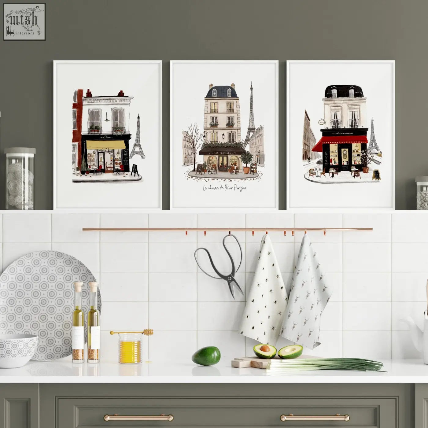 Three framed paris café street scene kitchen art prints with black red and beige buildings on white backgrounds