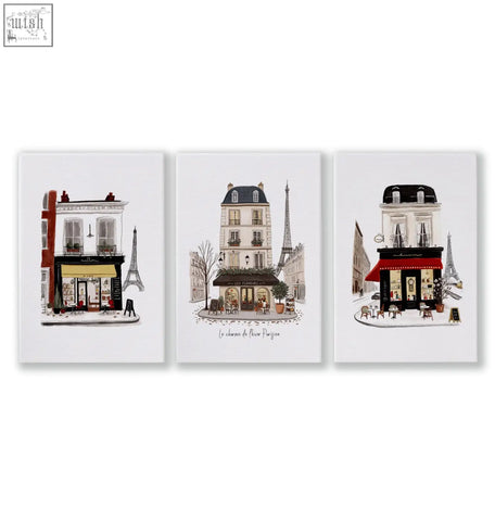 Set of three paris café street scene kitchen art prints featuring charming illustrated buildings and the eiffel tower in soft tones