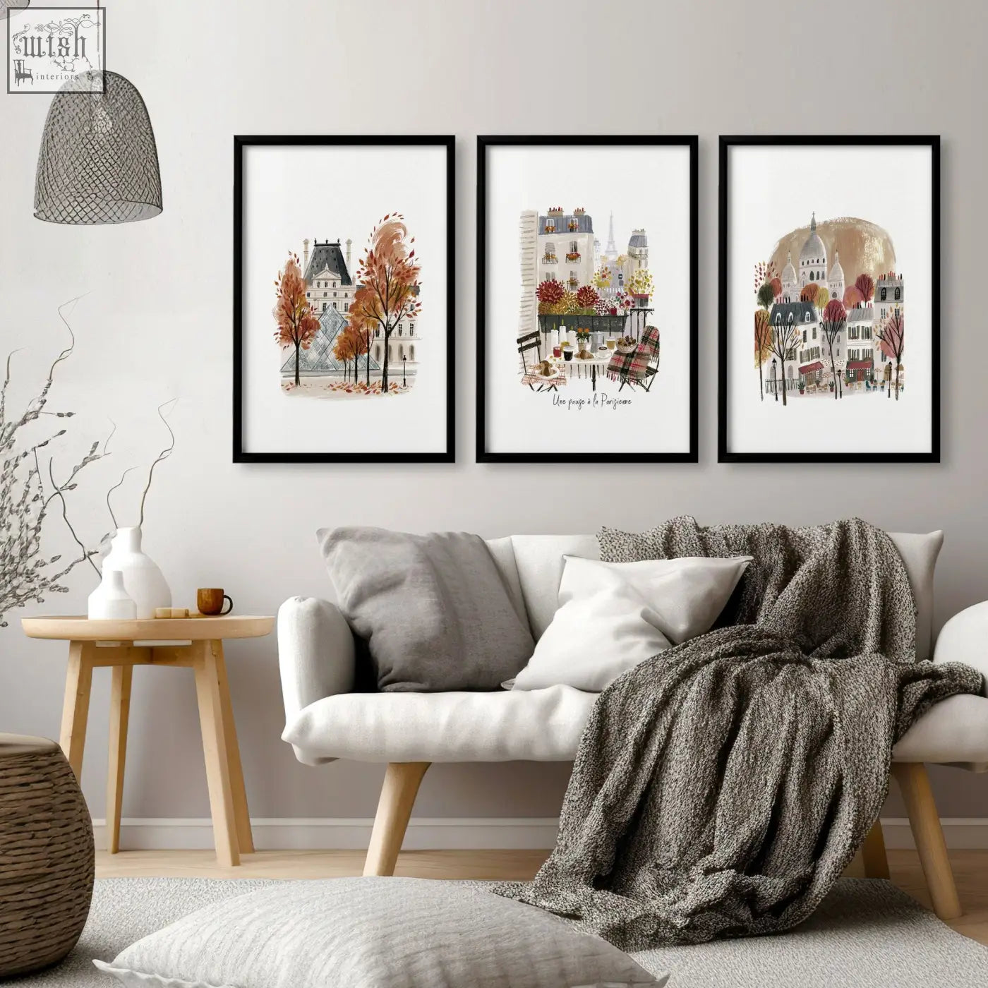 Three black framed living room wall art prints of paris autumn scenes featuring louvre eiffel tower and montmartre