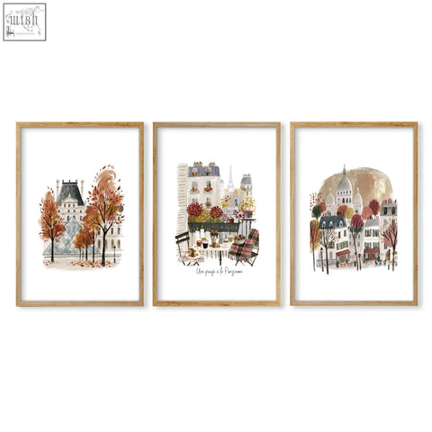 Set of three parisian watercolor art prints in light wood frames perfect for living room wall art decor