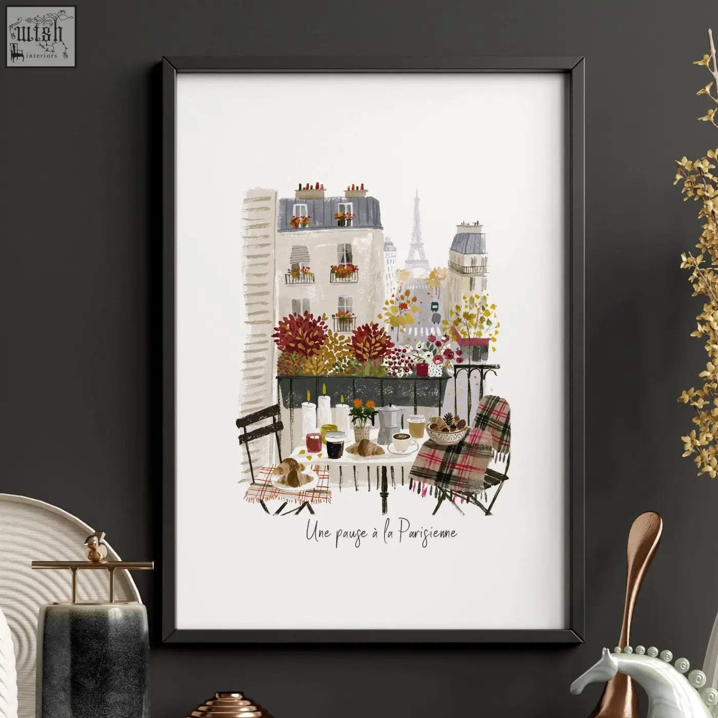 A framed paris travel wall art piece showing a colorful balcony scene with flowers, café furniture, and the eiffel tower