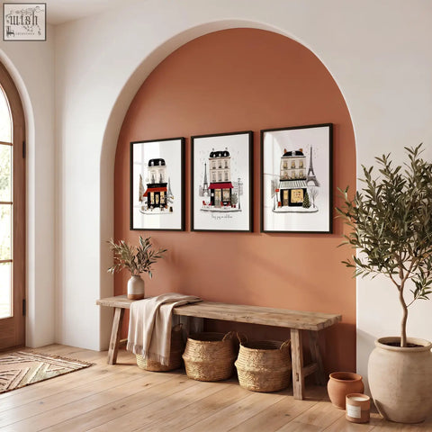 Three paris travel wall art pieces featuring black framed parisian buildings with white backgrounds in different styles