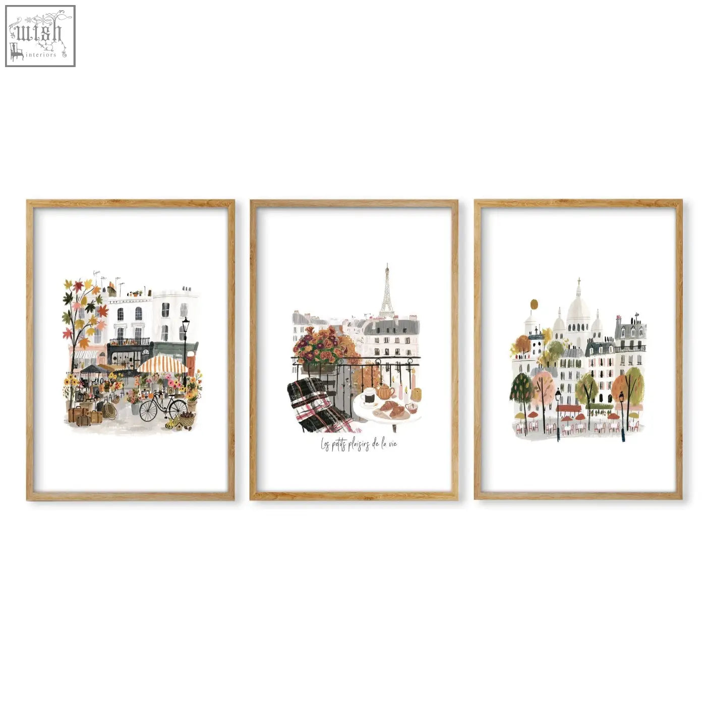 Set of three framed paris wall art prints with autumn watercolor scenes in light wood frames for home decor