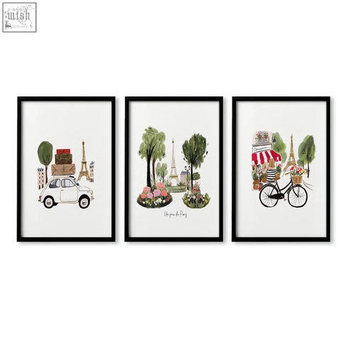 Set of three black-framed paris wall art prints featuring eiffel tower watercolor designs for travel decor