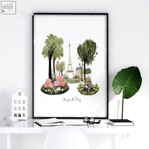 Black-framed paris wall art featuring a watercolor eiffel tower scene with green trees and pink flowers for home decor