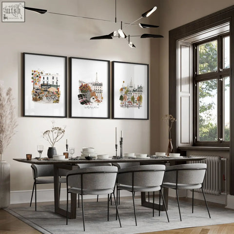 Three framed paris wall art autumn parisian scenes with eiffel tower hang above dining table in living room