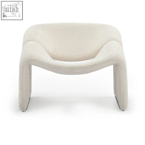 Cream-colored paris wawa boucle armchair with plush texture and modern sculpted design perfect for cozy spaces
