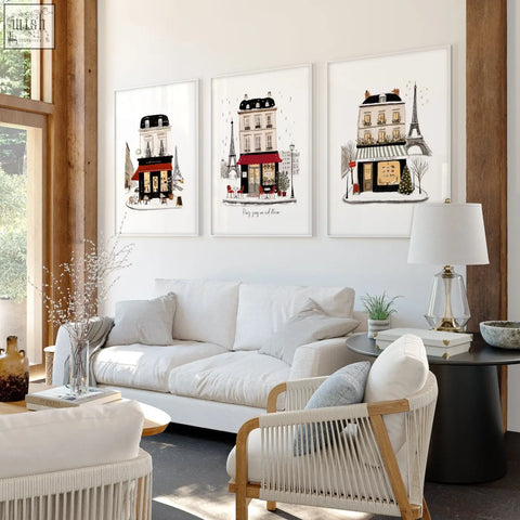 Three framed parisian-themed living room wall art with red awnings and eiffel tower for cozy living room decor