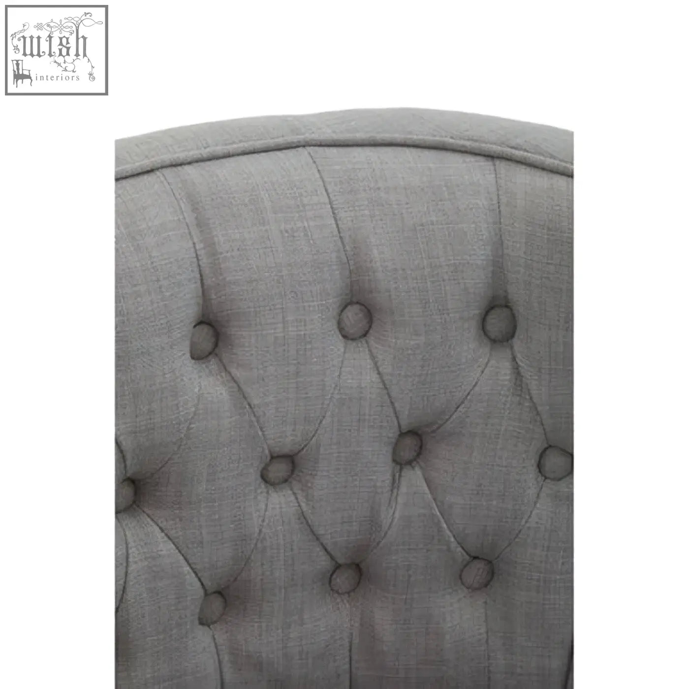 Back side of parkside grey fabric curved dining chair with grey tufted fabric and button details