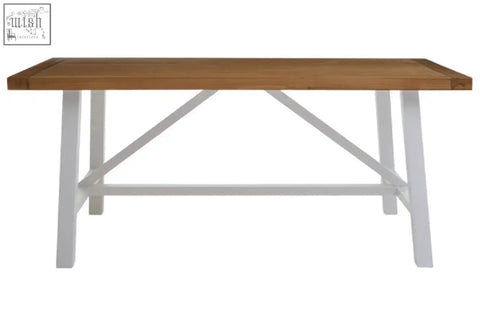 Parkside natural oak dining table with a light brown wooden top and white metal legs with x-shaped cross-brace design