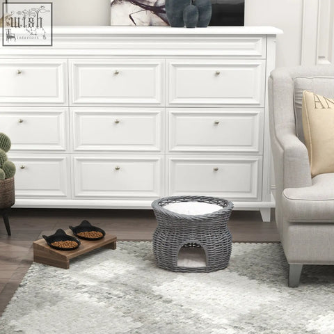 Gray woven wicker 2-tier cat house with arched entrance and white washable cushion for a cozy pet bed