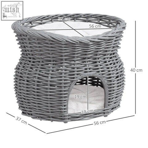 Gray woven wicker pet bed with soft white cushion and arched entrance in pawhut 2-tier cat house pet bed basket