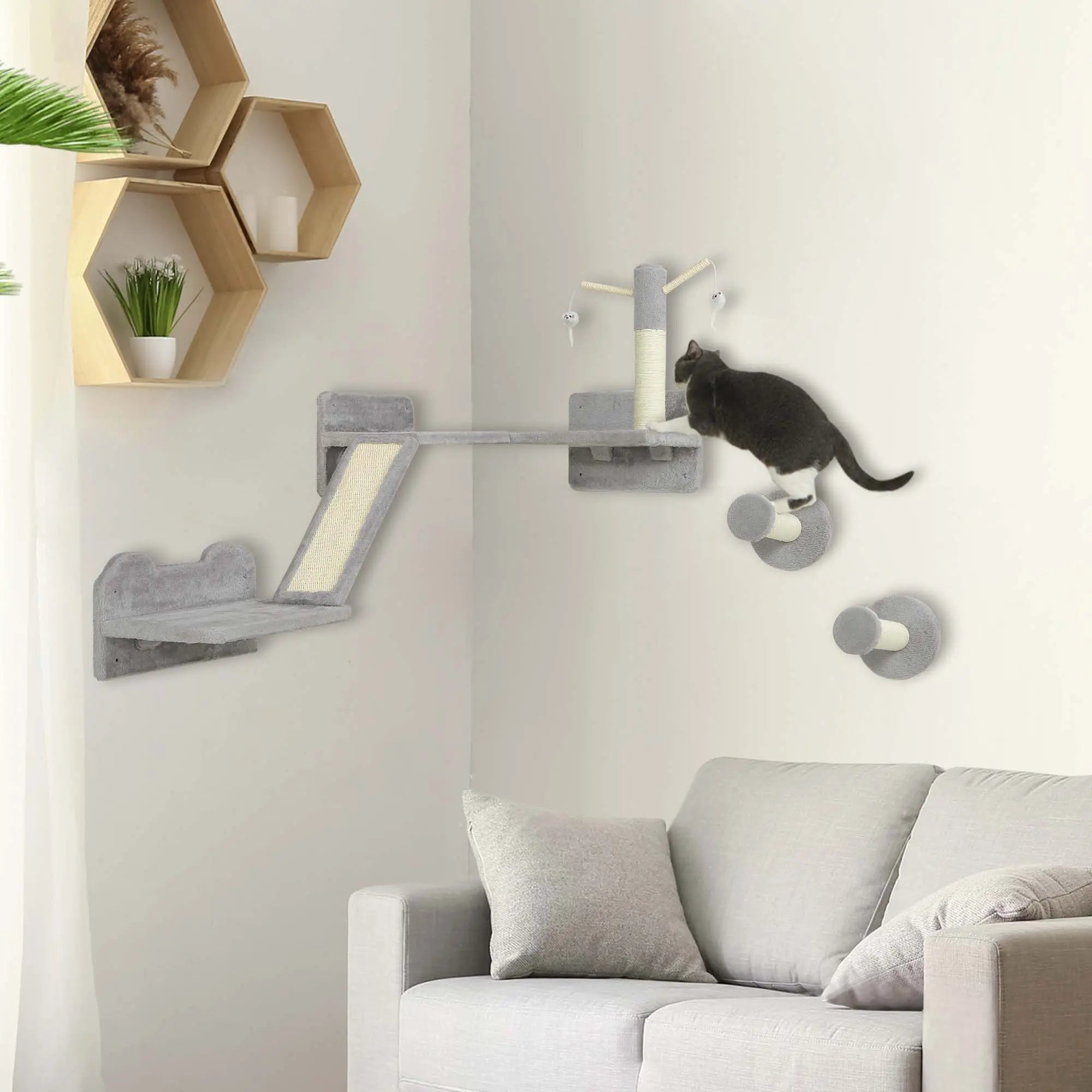 Gray pawhut cat tree with particle board scratching posts corner platform and toy balls for playful cats
