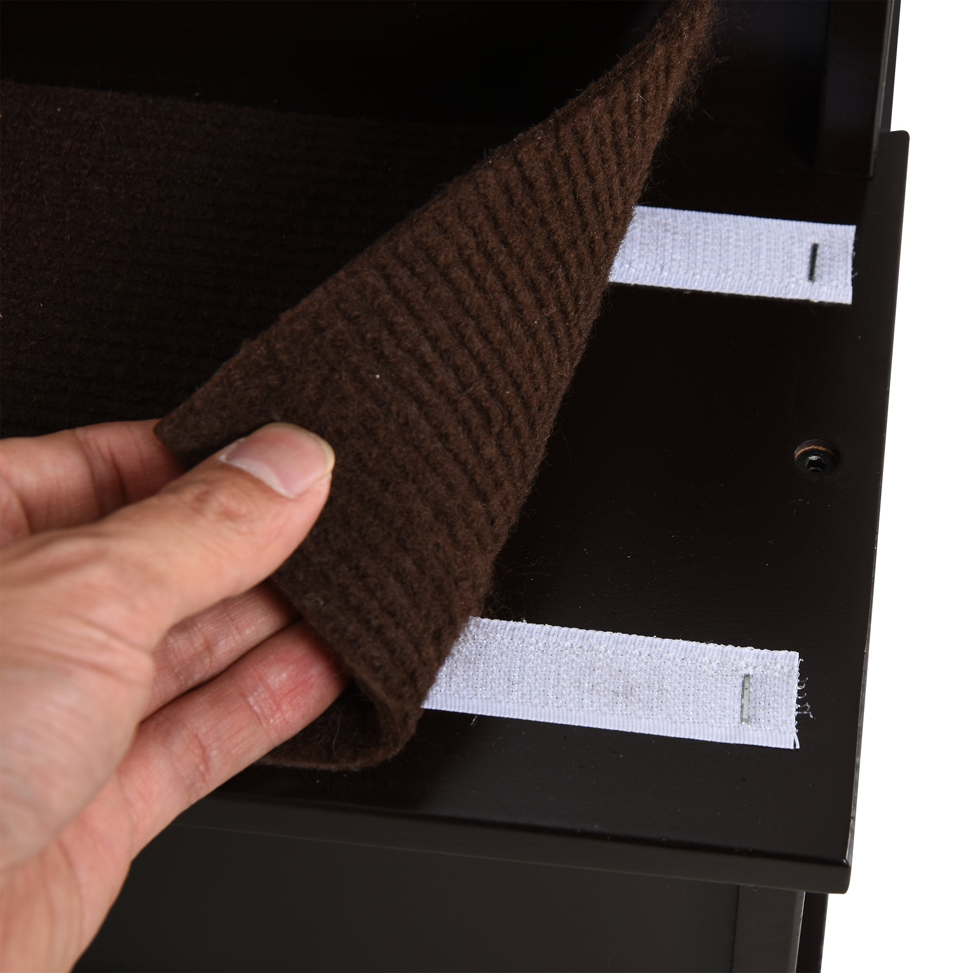 Dark brown felt pad with white adhesive strips for pawhut wooden dog steps designed to aid pets with mobility issues