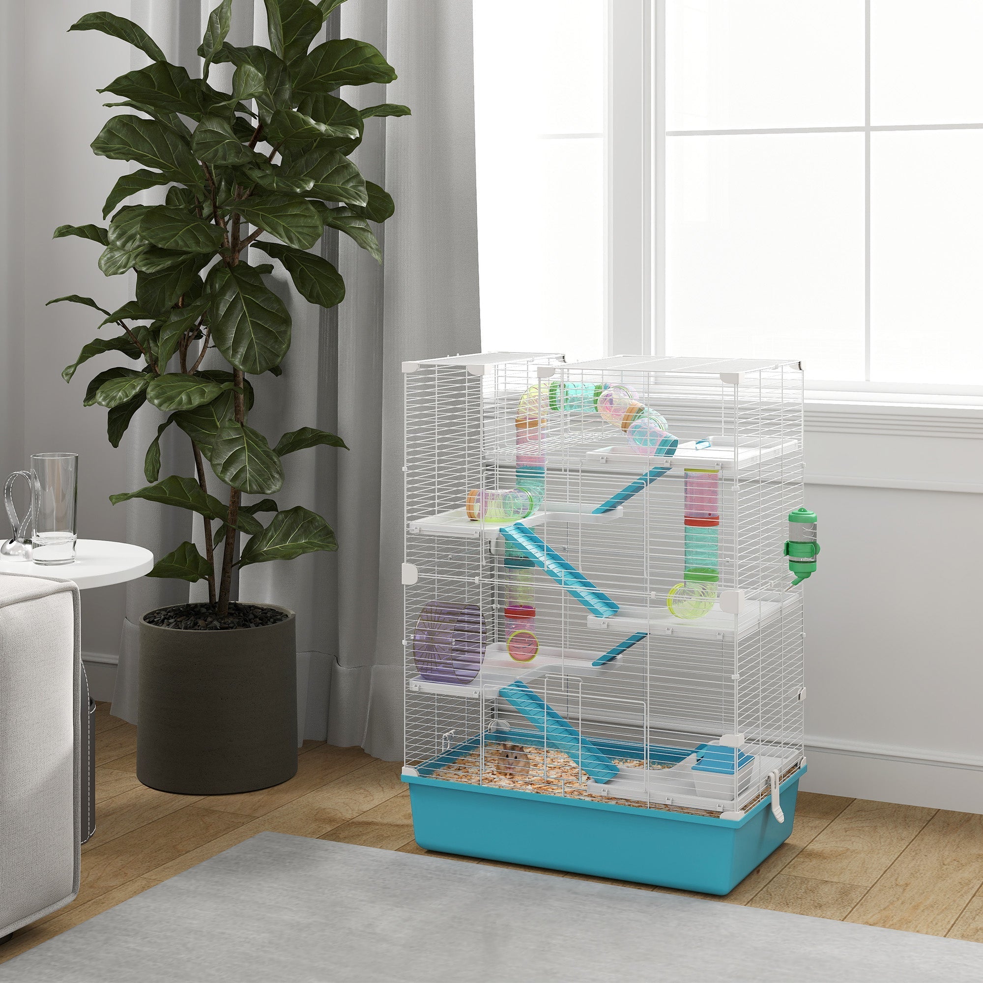 Multi-level white wire hamster cage with turquoise base 58l x 36w includes water bottle and colorful accessories
