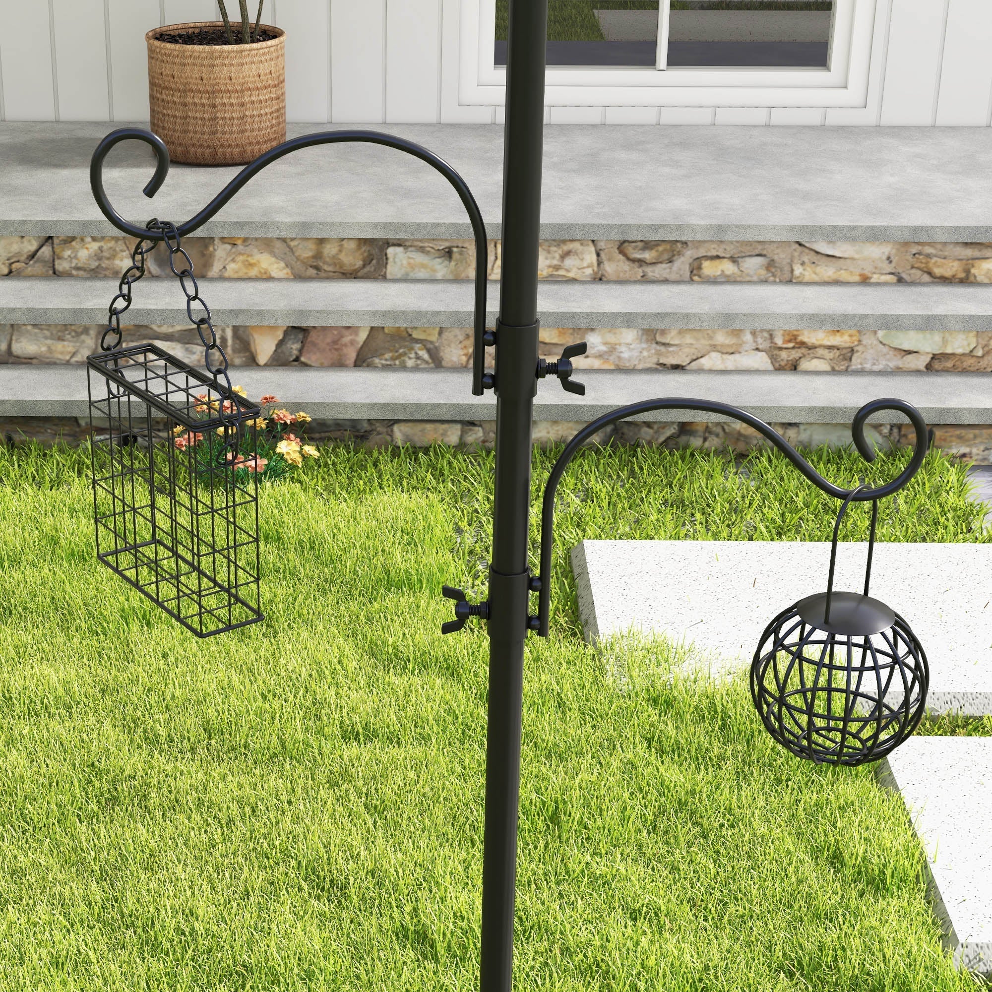 Black wrought iron bird feeding station hooks with rectangular cage and spherical globe design for outdoor use