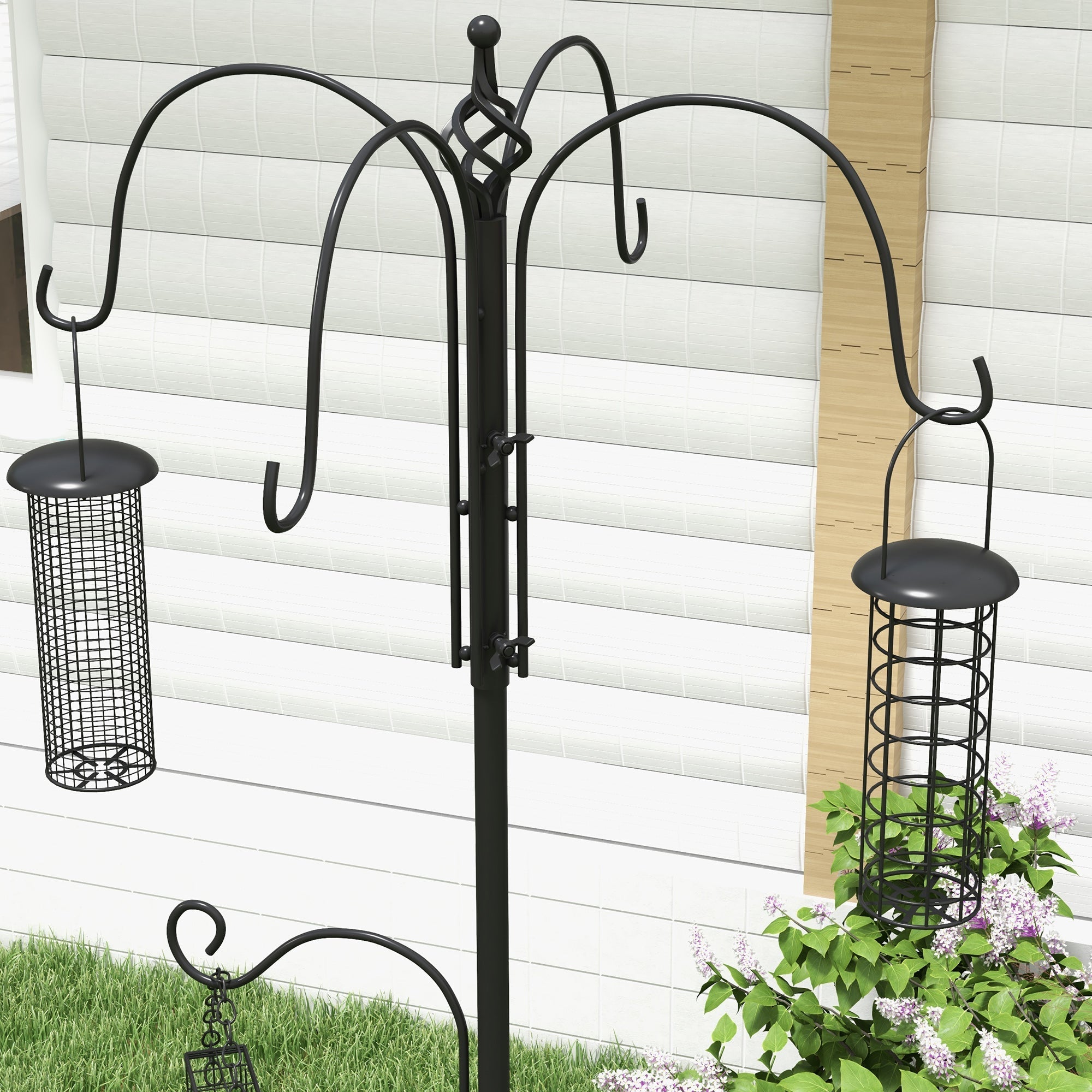 Black wrought iron pawhut bird feeding station with six curved hooks and decorative top for outdoor feeding