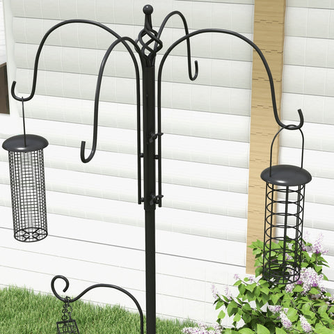 Black wrought iron pawhut bird feeding station with six curved hooks and decorative top for outdoor feeding