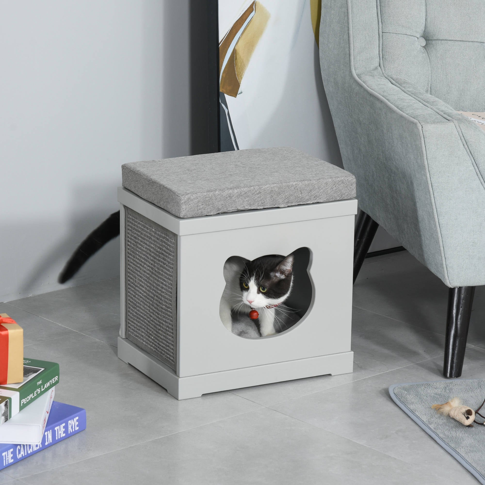 Gray pawhut cat house with cushioned top and removable sisal scratching pads black and white cat peeking out