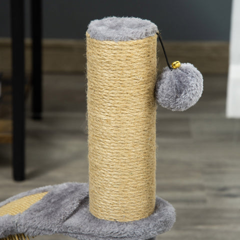 Gray fuzzy hanging ball with bell on black string dangling from jute post scratching massage board cat tree