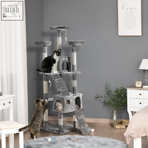 Gray pawhut cat tree with plush platforms and sisal scratching posts for active play and resting space