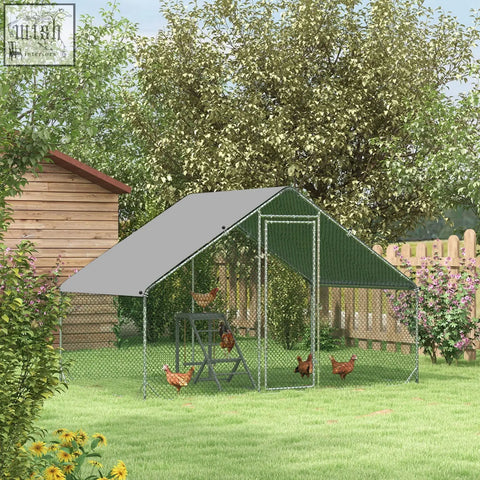 Gray and green solid galvanized chicken coop with wire mesh walls and slanted roof for garden pets and poultry