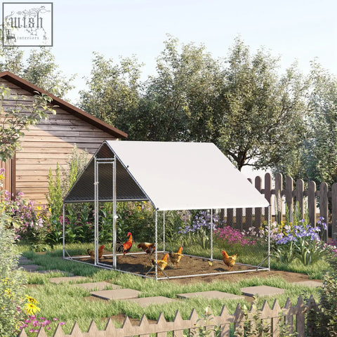 White roofed solid galvanized chicken coop with metal frame and wire mesh walls for garden poultry housing