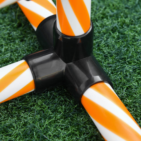 Orange and white striped plastic weave poles connected by black joints for pawhut dog agility training outdoors