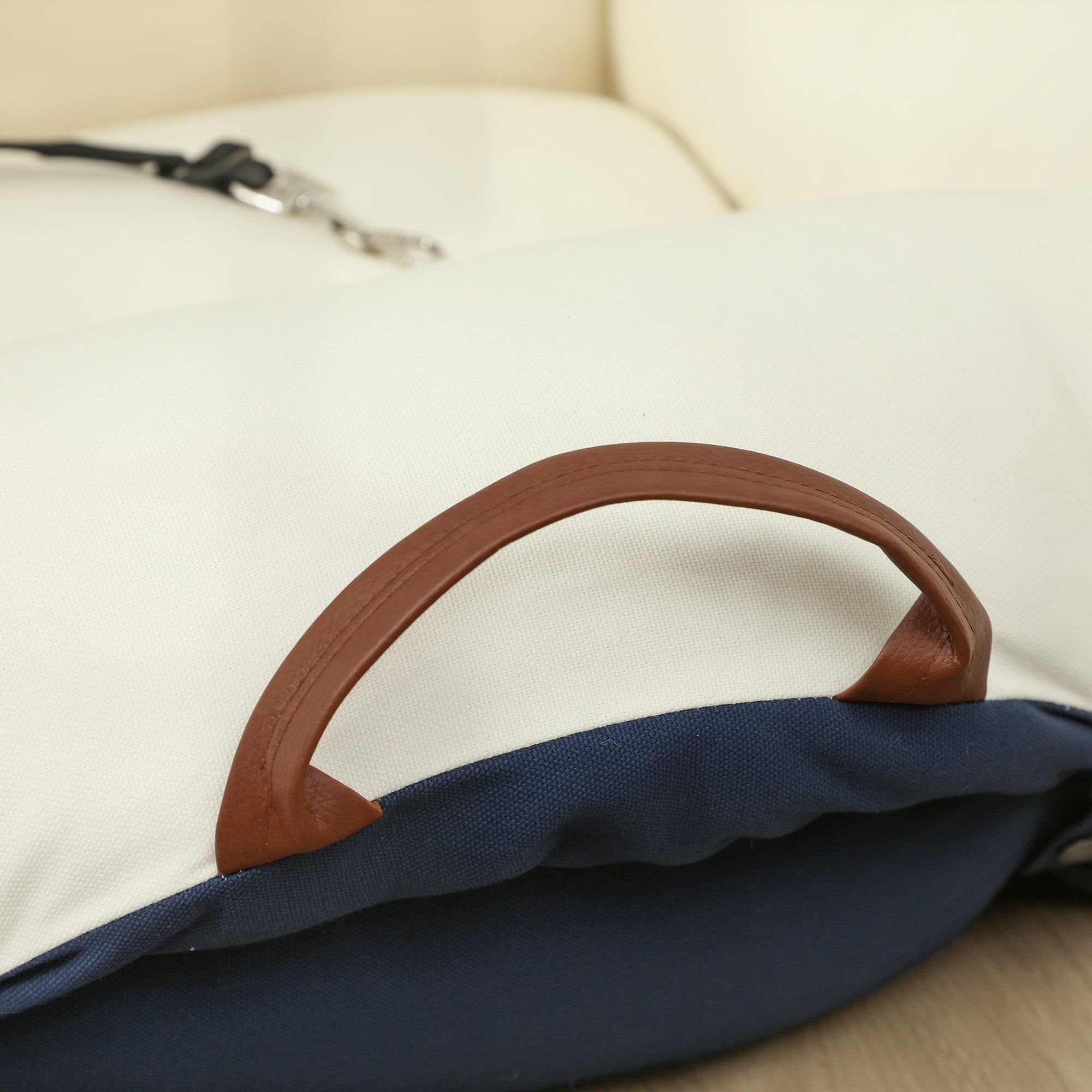 White and navy blue canvas tote bag with brown leather handle perfect for carrying pawhut dog car seat accessories