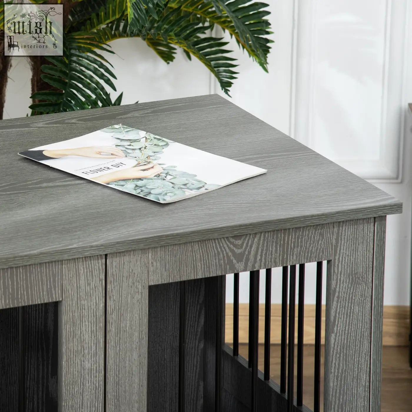 Gray wood-grain pawhut dog crate table with black slats and magnetic door for indoor use as dog cage