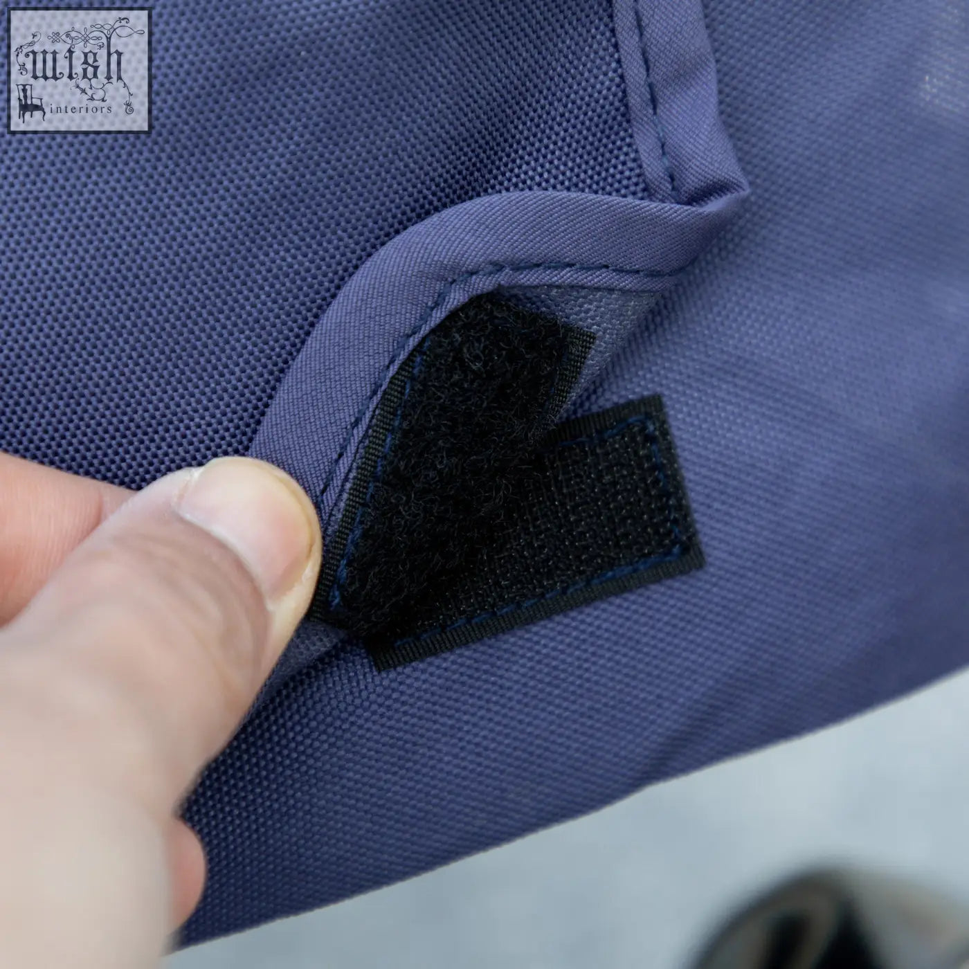 Navy blue fabric strap with black velcro on pawhut dog stroller featuring soft cushion for small and medium dogs