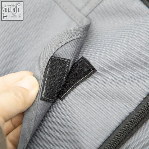 Gray pawhut dog stroller fabric with black velcro patches and stitched seams features soft cushion for comfort