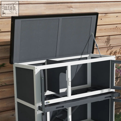 Pawhut double decker rabbit hutch in black and white metal with lift-up lid fir wood and two slide-out trays