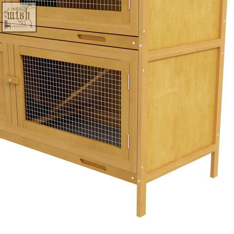 Light brown fir wood pawhut double decker rabbit hutch with four lockable doors and openable roof yellow color