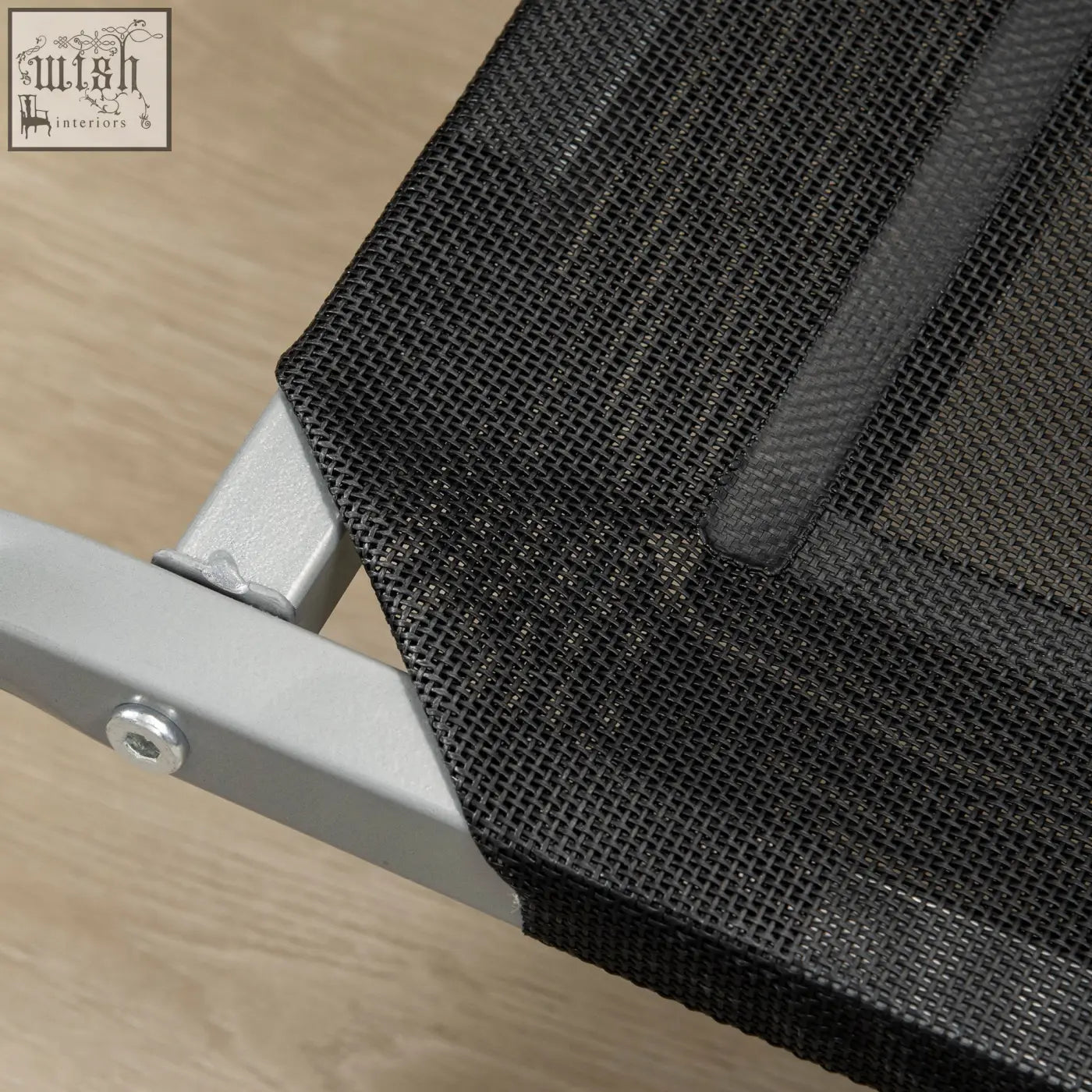 Black breathable mesh fabric with subtle texture attached to silver steel frame of pawhut elevated pet bed
