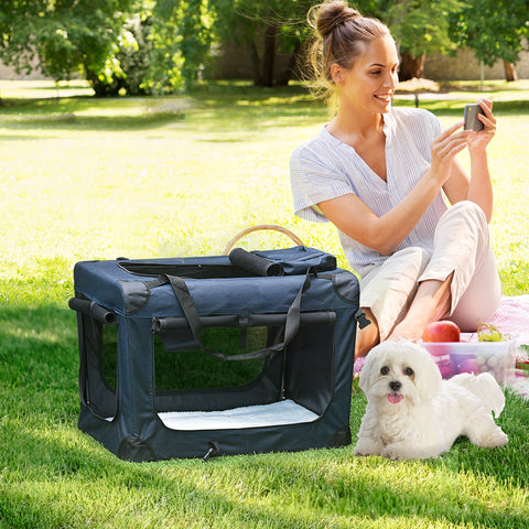 Navy blue pawhut foldable pet carrier with mesh doors, storage bags, and white lining for miniature dogs travel